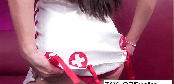  Nurse Taylor plays with her big boobs